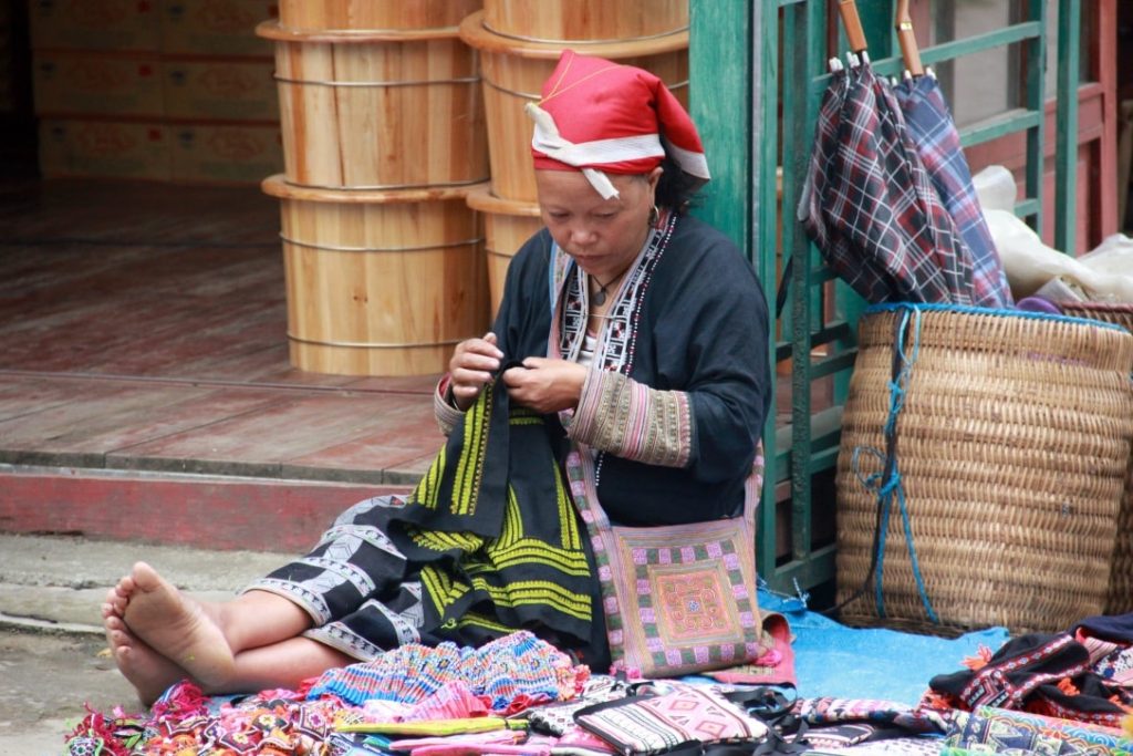 Ladies making handcrafts in the street