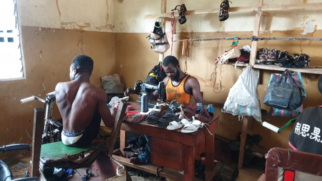 men-making-shoes